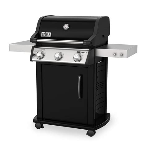 The tuck-away warming rack keeps food warm while the main dish grills underneath. . Weber spirit e315